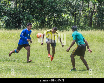 Santa Rita, Peru - Sep 19, 2018: Local people playing football in a small village in the middle of the Amazon Rain Forest, Border of Peru and Brazylia Stock Photo