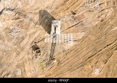 aerial view of construction site with crawler crane with wrecking ball for building works Stock Photo