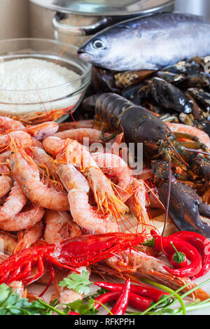Fresh uncooked sea food specialties in home kitchen Stock Photo