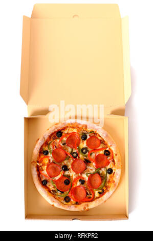 Freshly baked Italian pepperoni Pizza in an open delivery box isolated on a white background. Stock Photo