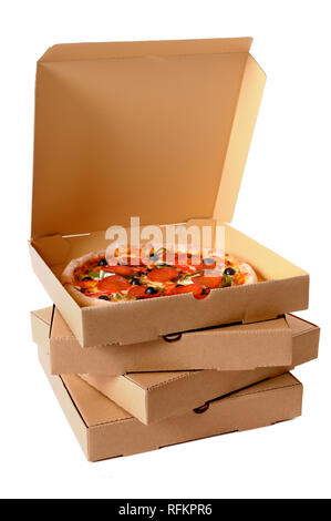 Freshly baked Italian pepperoni Pizza with a stack of delivery boxes isolated on a white background. Stock Photo