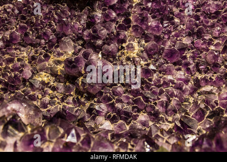 Amethyst geode mineral specimen. Violet texture from Natural Amethyst. Stock Photo