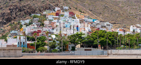 SAN ANDRES, CANARY ISLANDS, SPAIN - JULY 31, 2018: Panoramic view on the oldest village with colorful houses at the foot of the Anaga mountains, 7 km  Stock Photo