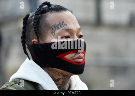 Face Tattooed guest with Gucci whool mask - StreetStyle at Louis