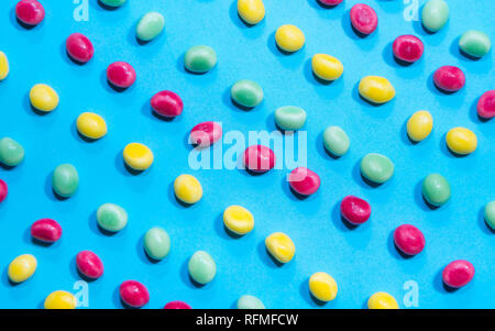 Pile of delicious colorful chewing candies background. Colourful sweets Stock Photo