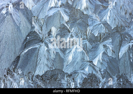 Frost patterns on Glass. Stock Photo