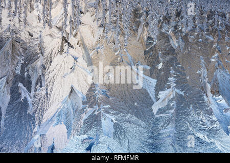 Frost patterns on Glass. Stock Photo