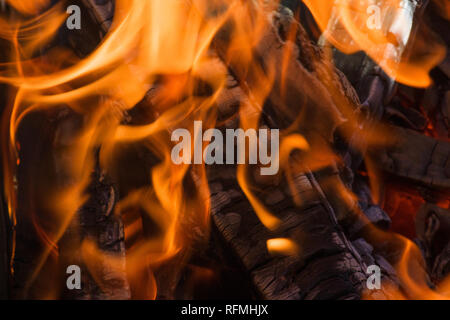 the black coals are hot red flame Stock Photo