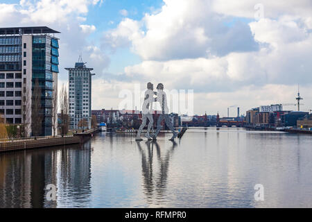 Berlin, Germany - February 25, 2015: Molecule Man sculpture on Spree River in Berlin. Designed by Jonathan Borofsky, dedicated to the unity of three d Stock Photo