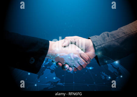 Global partnership concept with businessman hand shake with world graphic illustration Stock Photo