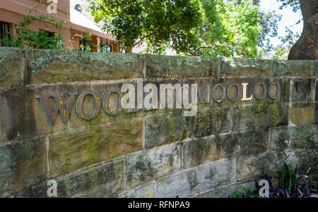 Woolloomooloo neighbourhood entrance sign with name written on a wall in Sydney NSW Australia Stock Photo