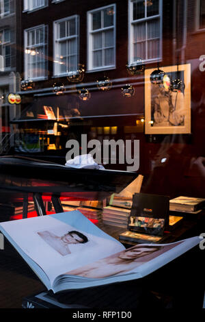 Amsterdam, Netherlands - 30 October 2016: Reflection of an art bookstore Stock Photo