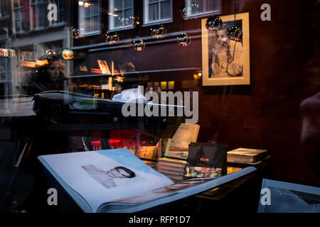 Amsterdam, Netherlands - 30 October 2016: Reflection of an art bookstore Stock Photo