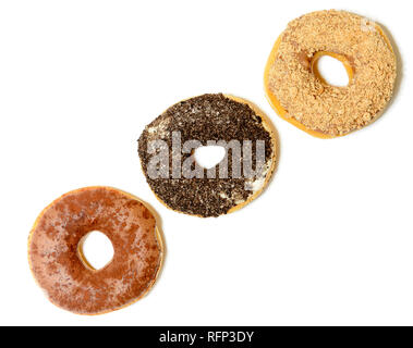 three donuts with sprinkles, isolated on white background Stock Photo