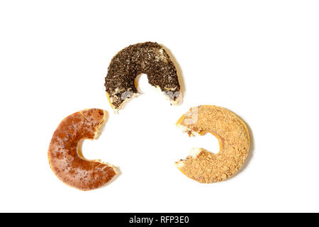 three donuts with sprinkles and a bitemark, isolated on white background Stock Photo