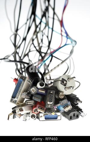 Different cables and plugs for electronical hardware and computer Stock Photo