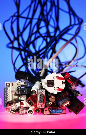 Different cables and plugs for electronical hardware and computer Stock Photo
