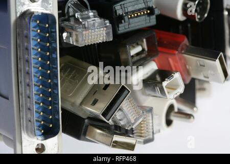 Different cables and plugs for electronical hardware and computer Stock Photo