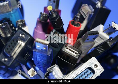Different cables and plugs for electronical hardware and computer Stock Photo