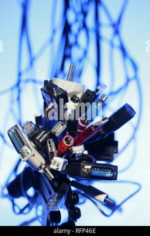 Different cables and plugs for electronical hardware and computer Stock Photo