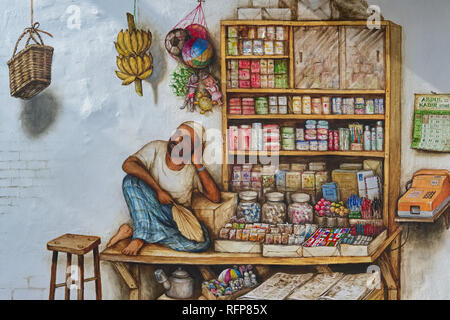 Part of a wall painting by artist Yip Yew Chong in Mohamed Ali Lane in Chinatown, Singapore, depicting a Muslim shopkeeper of days gone by Stock Photo
