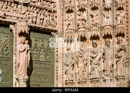 Figures from the main portal of the west façade on the cathedral of Strasbourg, France Stock Photo