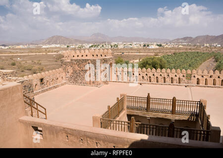 Terrace of the fort of Jabrin and in the background of Bahla and date crops (Oman) Stock Photo