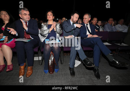 Deputy leader of Fianna Fail Dara Calleary (left) Sinn Fein leader Mary Lou McDonald (second left), SDLP leader Colum Eastwood and Minister for Education in the Republic of Ireland Joe McHugh (right) in attendance at 'Beyond Brexit - The Future of Ireland' an event focusing on nationalism's response to Brexit at the Waterfront Hall in Belfast. Stock Photo