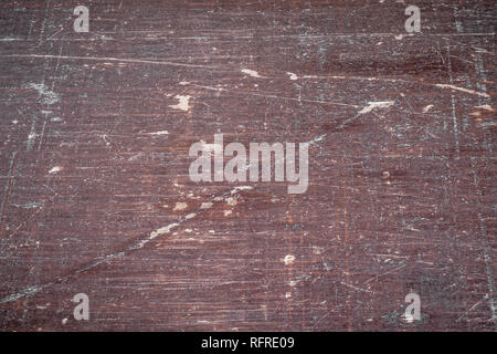 Texture on an old scraped piece of wood from a piece of furniture Stock Photo