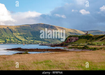 Western coast of County Antrim, Northern Ireland, UK, with the ruin of medieval Red Bay Castle, cliffs near Glenariff, Watrerfoot and Cushendall Stock Photo