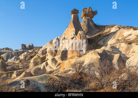Extreme terrain of Cappadocia with volcanic rock formations known as fairy chimneys, Turkey Stock Photo