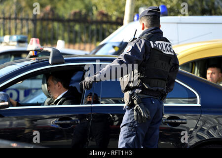 French police officer regulating traffic - Paris - France Stock Photo