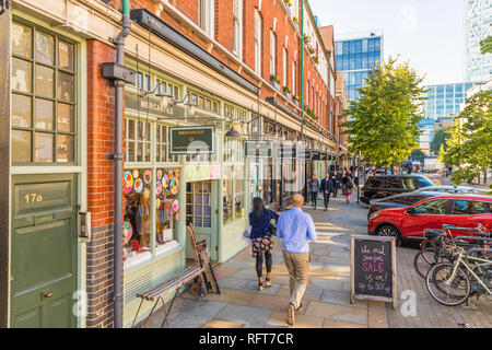 A beautiful street and stores around the Old Spitalfields Market, London, England, United Kingdom, Europe Stock Photo