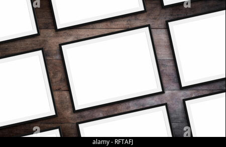 set of frames on wood background - blank picture frames mock-up Stock Photo