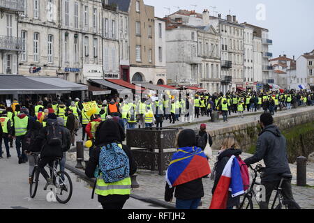 La Rochelle, France. 26th January, 2019. In La Rochelle, this Saturday, January 26, 2019, the rally counted more than a thousand protesters. Within the procession, formed of Rochelais but also of inhabitants of all the department, several syndicalists of the CGT, Sud Solidaires and the FSU were present. In the middle of the afternoon, more than 300 yellow vests blocked the northern entrance to the city, the N11 arriving from Niort and the ring road to the Ile de Ré. Credit: Fabrice Restier/Alamy Live News Stock Photo