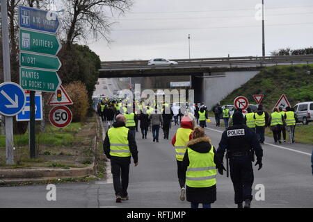 La Rochelle, France. 26th January, 2019. In La Rochelle, this Saturday, January 26, 2019, the rally counted more than a thousand protesters. Within the procession, formed of Rochelais but also of inhabitants of all the department, several syndicalists of the CGT, Sud Solidaires and the FSU were present. In the middle of the afternoon, more than 300 yellow vests blocked the northern entrance to the city, the N11 arriving from Niort and the ring road to the Ile de Ré. Credit: Fabrice Restier/Alamy Live News Stock Photo