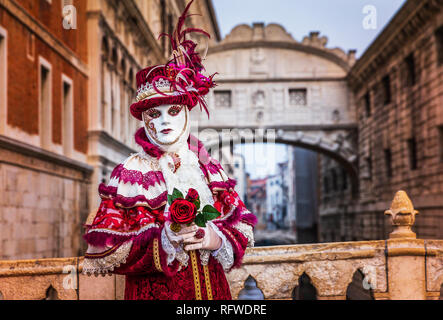 Venice, Italy. Carnival of Venice, beautiful mask at the Bridge of Sighs. Stock Photo