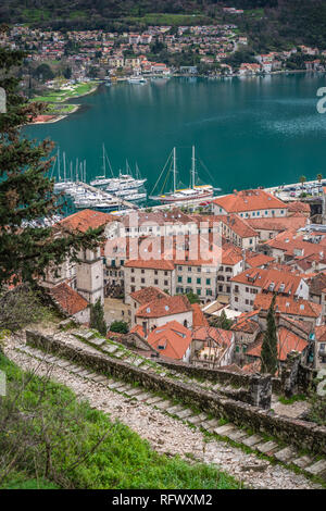 Kotor, Montenegro - April 2018 : Stony trail and steps leading to the Kotor fortress above Kotor town Stock Photo