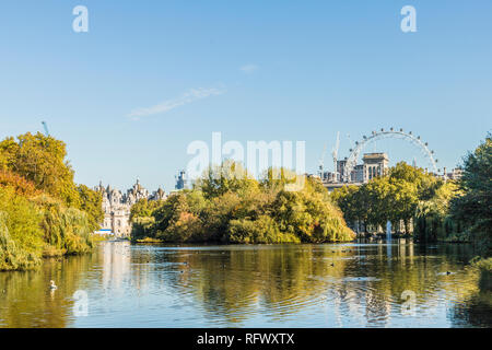 A view of St. James's Park lake and the London Eye in the background in St. James's Park, London, England, United Kingdom, Europe Stock Photo