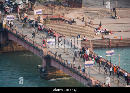 Bridge over the Ganges River in the holy city of Haridwar, Uttarakhand, India Stock Photo