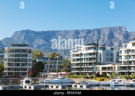 Luxury apartment buildings and yachts and Table Mountain view in Cape Town Stock Photo