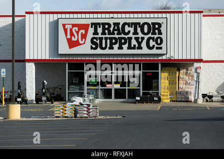 A logo sign outside of a Tractor Supply Company retail store location