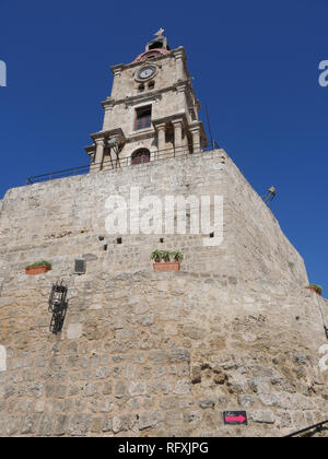 A landmark in Rhodes Town is the Roloi Clock Tower. The best panoramic view of Rhodes is found at the top of this stunning 7th-century clock-tower Stock Photo