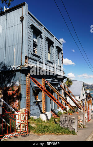 Earthquake damaged building being propped up, Lyttelton, Christchurch, New Zealand. Stock Photo