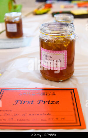 Close-up of 1st prize winning jar of marmalade & certificate - competition entry at Gardeners' Show, Burley-in-Wharfedale, West Yorkshire, England, UK Stock Photo