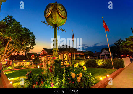 Solvang, California, United States - August 10, 2018: Vintage clock in the main street at evening in the historic downtown of Solvang Danish village Stock Photo