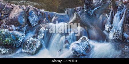 Panoramic image of icy river flow at winter Stock Photo