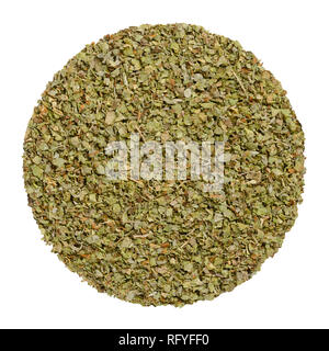 Dried marjoram, herb circle from above, isolated, over white. Disc made of Origanum majorana, also sweet, knotted or pot marjoram. Green herb. Stock Photo