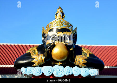 Phra Rahu in Thailand (Rahu om jan), Rahu the mythical of Darkness. He has half body, but invisible. The statue pose is the giant swallow the moon for Stock Photo