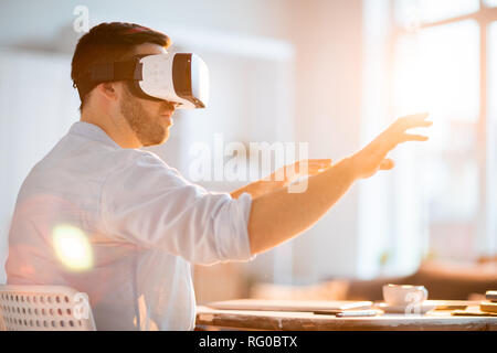 Man in virtual world Stock Photo